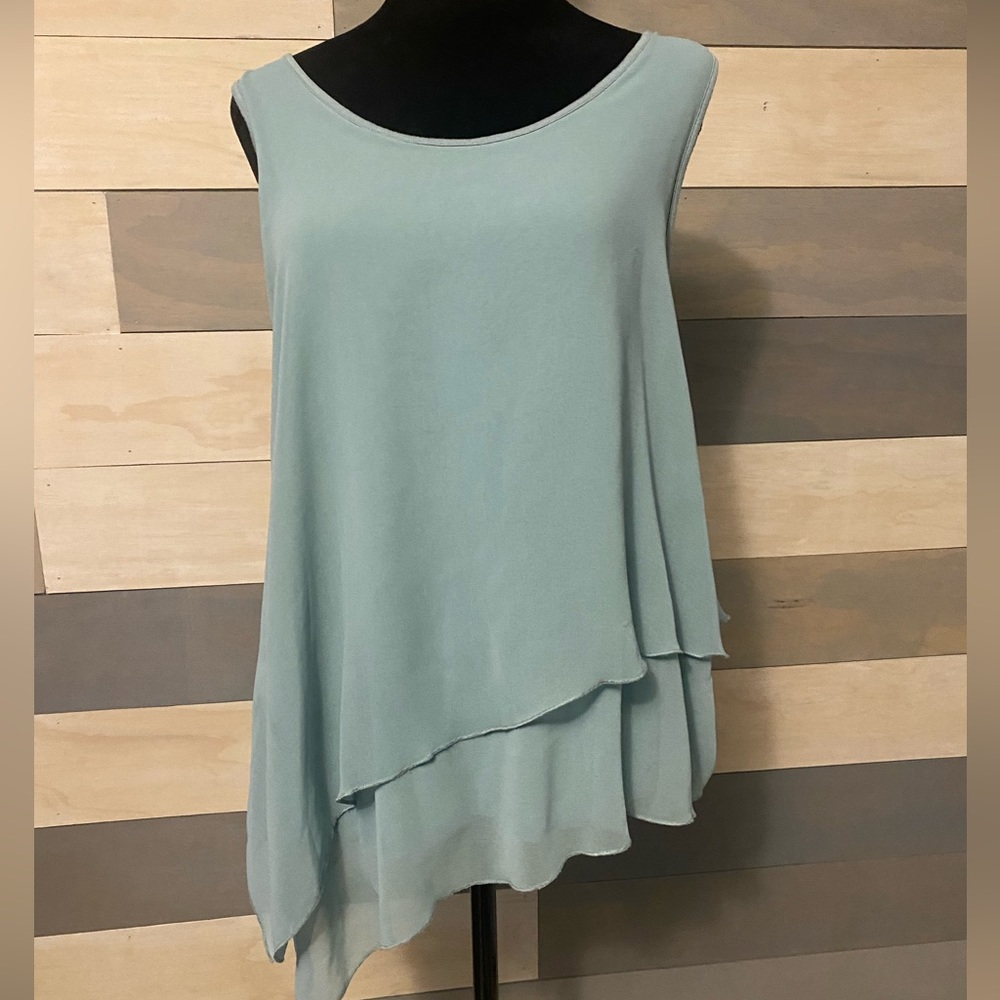 Summer top, asymmetrical layers of blue. Made by design story size large.